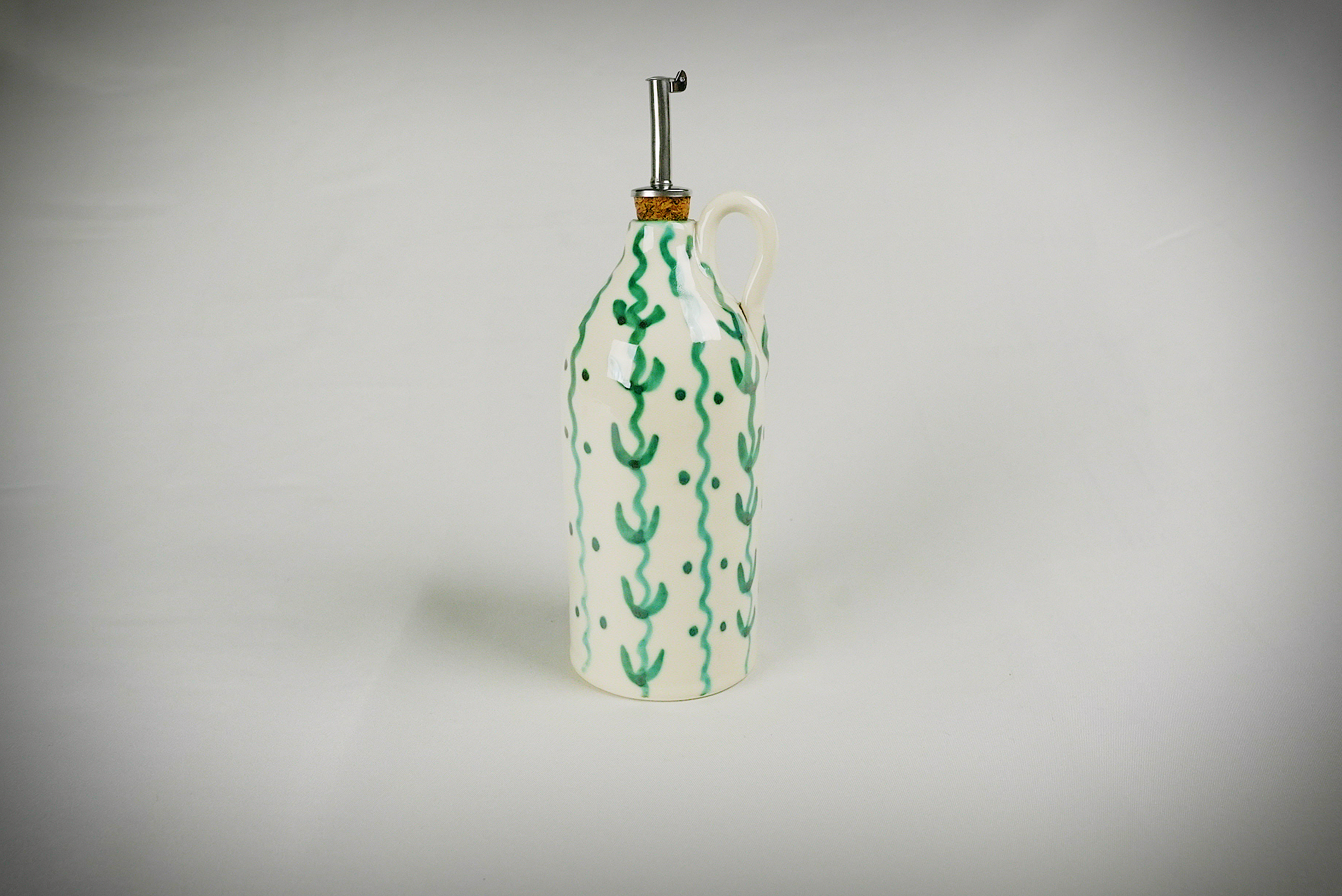 Handgemaakte olijfoliefles detail